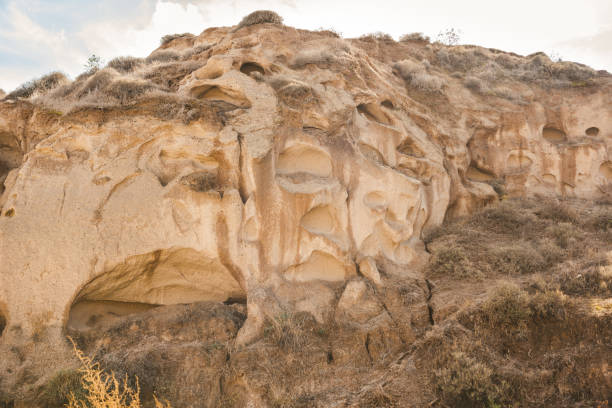 istock Road to Eros beach with unique white-brown cliffs 1136823011
