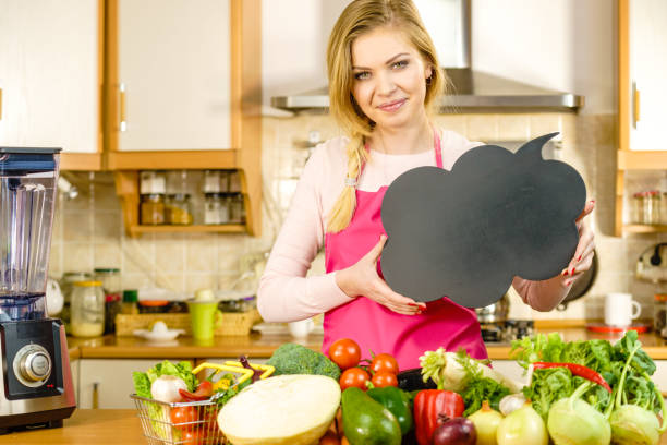 istock Woman with speech bubble and vegetables 1136823012