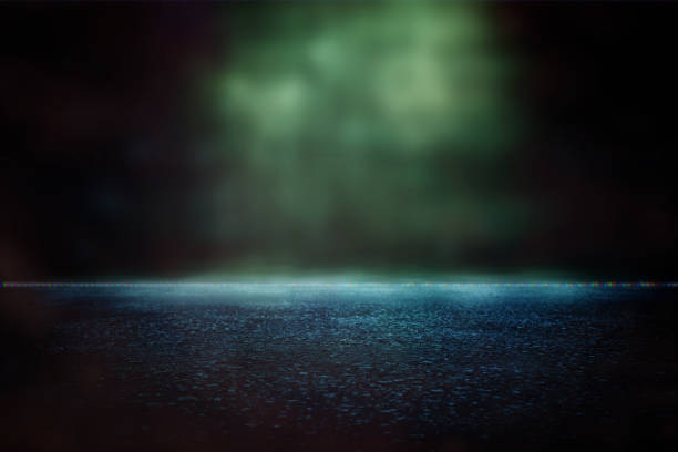 istock Spotlight over concrete floor. dark black background 1136823838