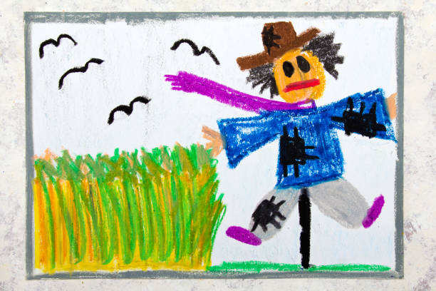 istock Colorful hand drawing: scary scarecrow next to the grain field 1136823963