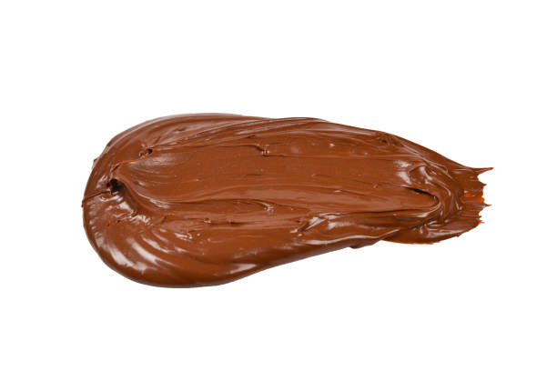 istock Chocolate cream background. Space for text or design. Isolated on white. 1136827538