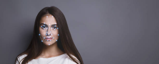 Futuristic and technological scanning of face for facial recognition Biometric verification. Facial recognition of young woman via polygon mask on face, panorama with copy space scanning activity photos stock pictures, royalty-free photos & images