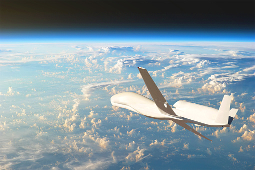 Unmanned aircraft flying in the upper atmosphere, the study of the gas shells of the planet Earth. Elements of this image furnished by NASA