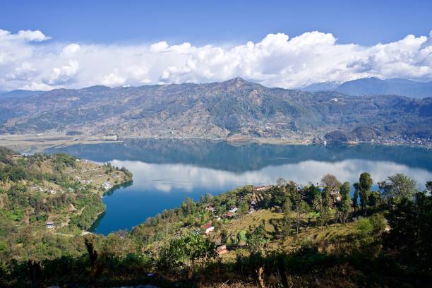 istock Blue Sky, Clouds, Mountains, Fewa Lake, Reflection, Pokhara, Nepal 1136827727