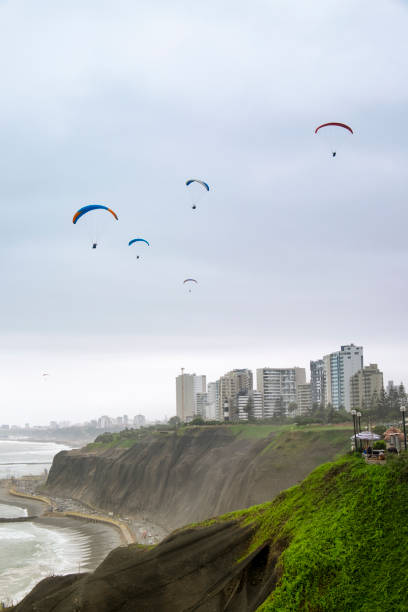 istock Paragliders Flying Over The Coast In Miraflores, Lima, Peru 1136829741