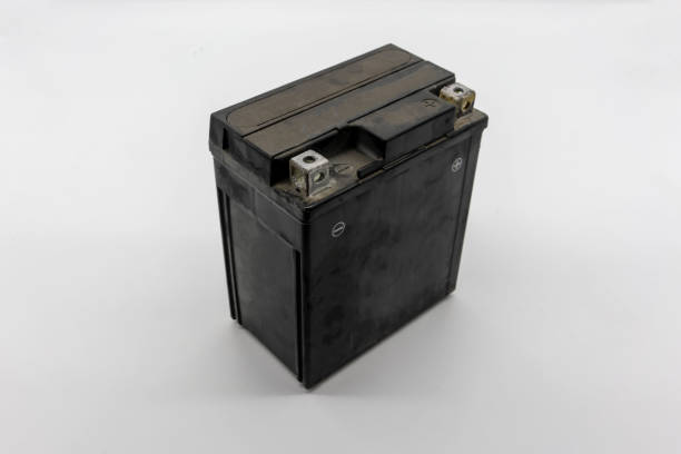 istock Used motorcycle black battery isolated on white background. 1136829995