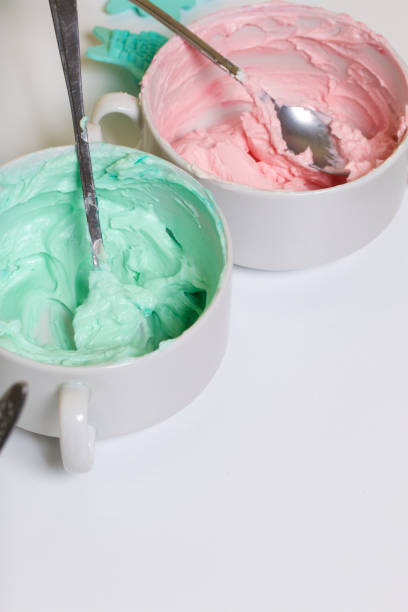 istock Cream of different colors for decorating waffle cake. 1136830497