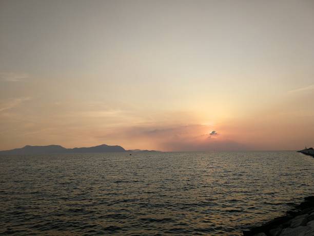 istock Beautiful sunset and sun light at Thailand beach 1136832891
