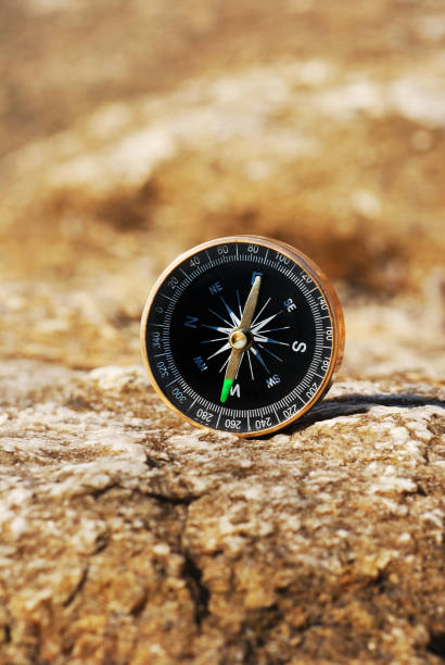 istock Compass on the rock, sign to predict something 1136833090