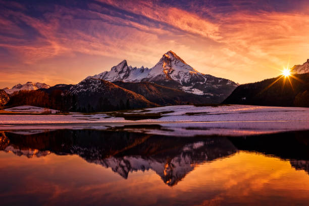 Watzmann in Alps, dramatic reflection at sunset - National Park Berchtesgaden Winter, Snow, Germany, Bavaria, Berchtesgaden bavarian alps photos stock pictures, royalty-free photos & images