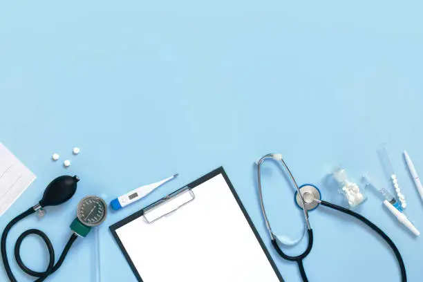 Photo of Blue background with medical tools