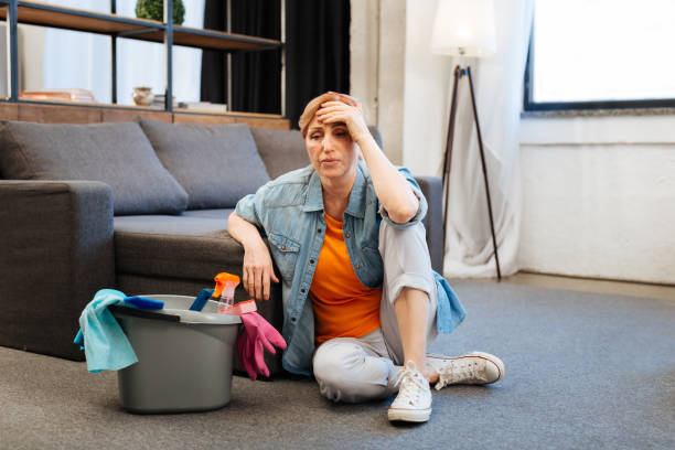 istock Tired distressed woman feeling sick after intense cleaning 1136838732