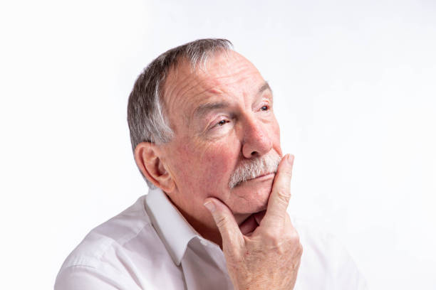 istock portrait of handsome senior man 1136839974