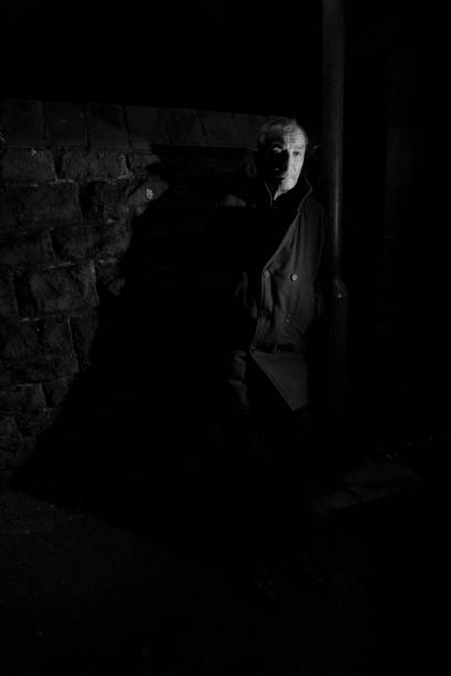 istock mature man in dark alley 1136842813