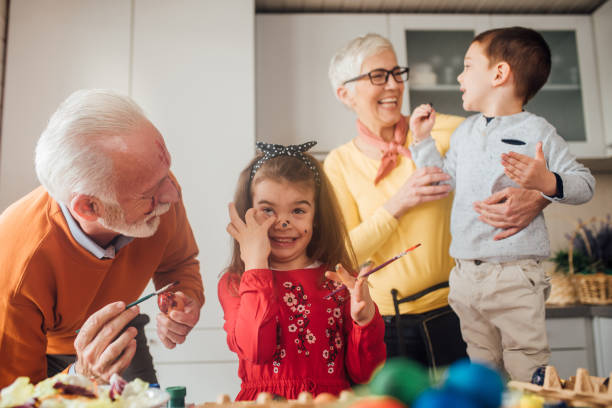 istock Kids having fun with grandparents 1136842861
