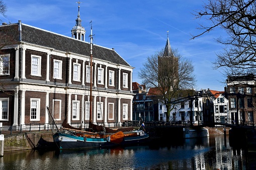 Historic town hall at the frozen canal of Dokkum, Netherlands
