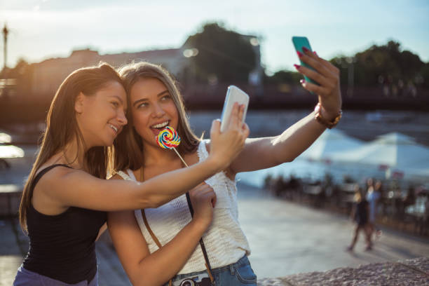 istock Best friends taking selfie together 1136845237