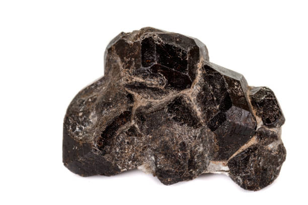 istock macro mineral stone  Garnet, on a white background 1136846627