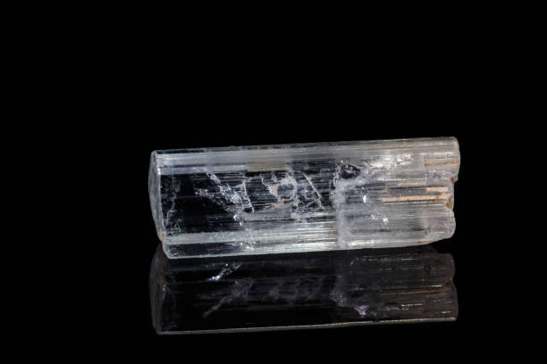 istock macro mineral stone Topaz on a black background 1136848043