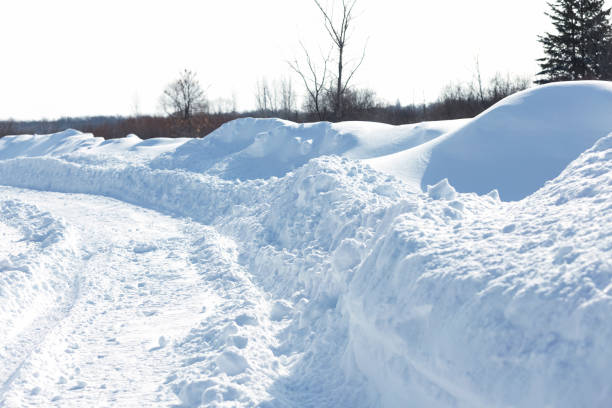 istock Empty Snow Covered Country Road 1136848460