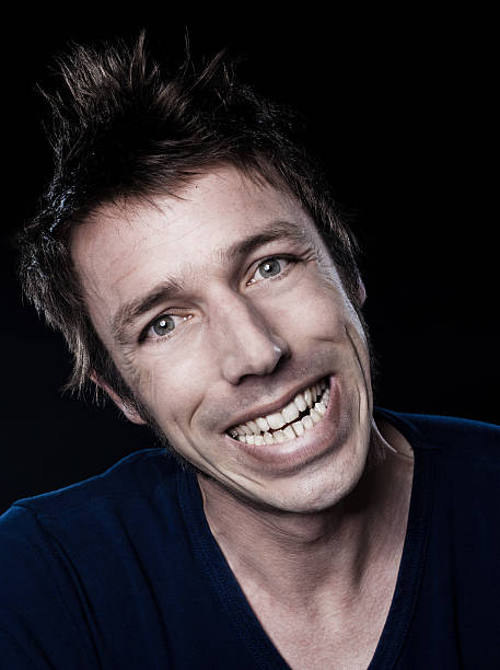 istock Funny Man Portrait grimacing toothy smile 113684923