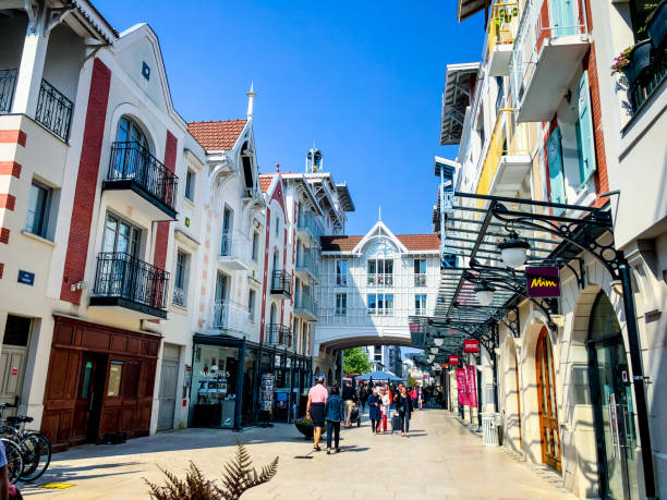 People walking and shopping in Arcachon downtown, France stock photo