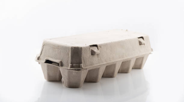 istock Egg carton for ten eggs, closed, isolated on white 1136852687