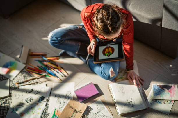 istock Artist Busy At Home 1136855137