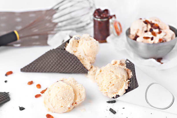 istock Delicious malaga ice cream black cones with seedless raisins 1136855353