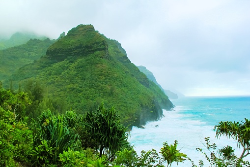 green mountain with blue ocean view at Kauai, Hawaii, USA