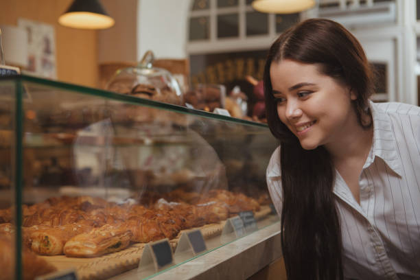 istock Female customer at bakery store 1136856737