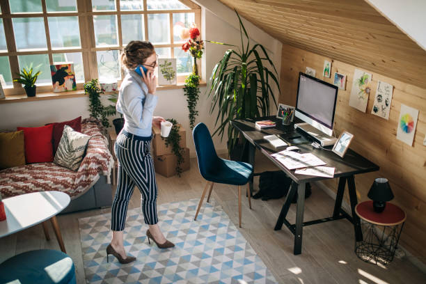 istock Business Phone Call In Pet Friendly Office 1136856961