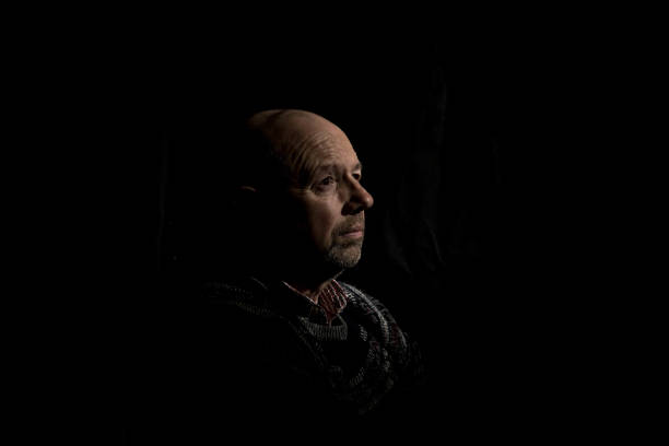 istock senior man in contemplative mood 1136860632