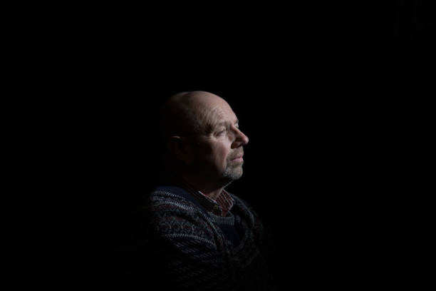 istock senior man in contemplative mood 1136860635