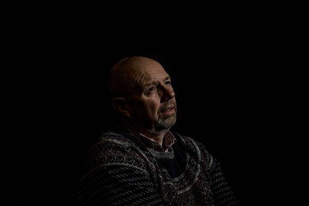 istock senior man in contemplative mood 1136860636