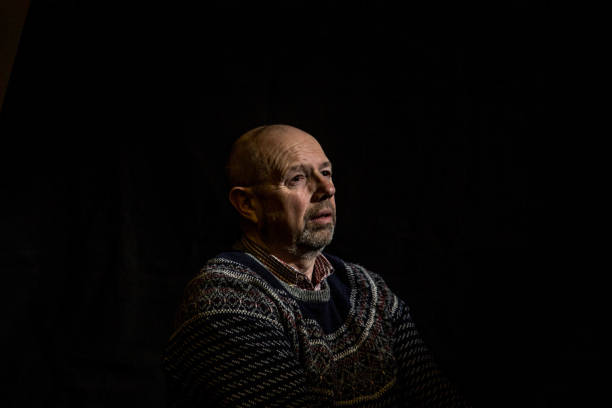istock senior man in contemplative mood 1136860641