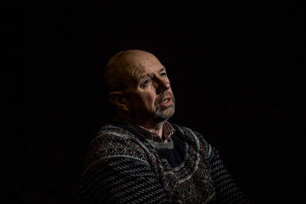 istock senior man in contemplative mood 1136860647