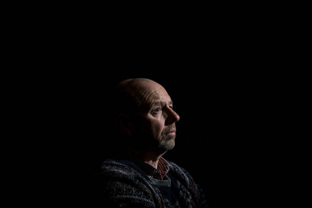 istock senior man in contemplative mood 1136860648