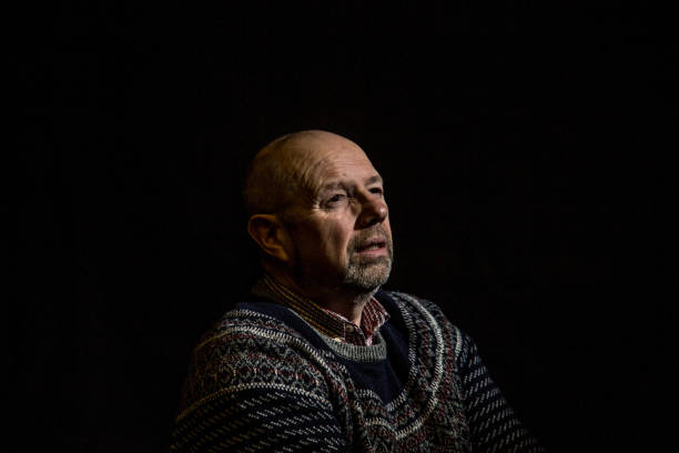 istock senior man in contemplative mood 1136860656