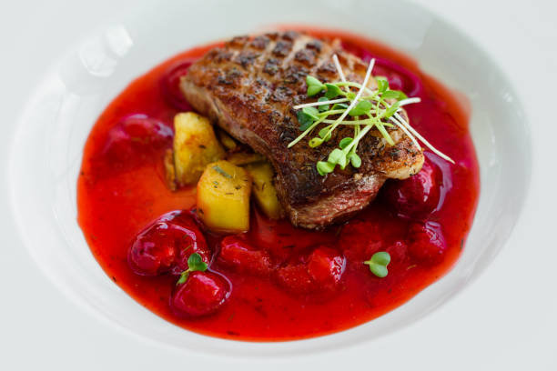 istock Steak  from fillet of a duck with caramelized strawberry 1136862582