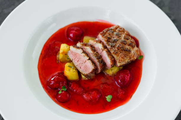 istock Steak  from fillet of a duck with caramelized strawberry 1136862741
