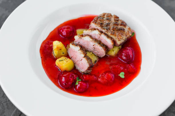 istock Steak  from fillet of a duck with caramelized strawberry 1136862753