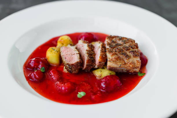 istock Steak  from fillet of a duck with caramelized strawberry 1136862756