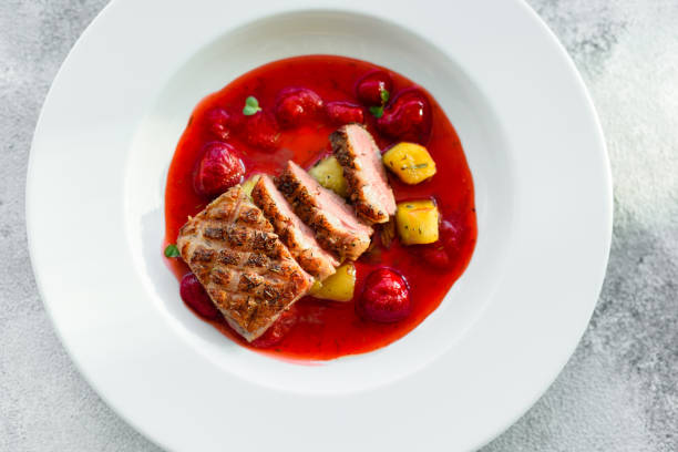 istock Steak  from fillet of a duck with caramelized strawberry 1136862773