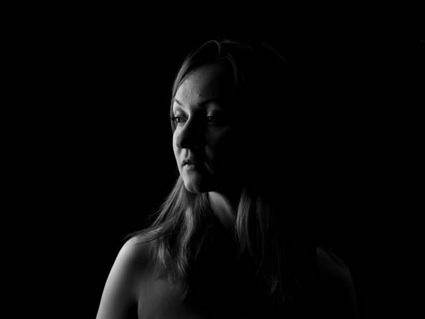 istock Young Woman Showing Expresion Black & White Isolated 1136863998