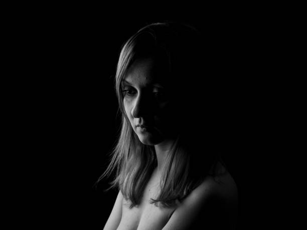 istock Young Woman Showing Expresion Black & White Isolated 1136864045