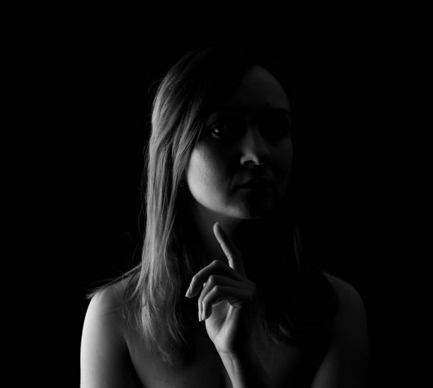 istock Young Woman Showing Expresion Black & White Isolated 1136864145