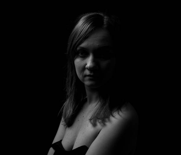 istock Young Woman Showing Expresion Black & White Isolated 1136864148