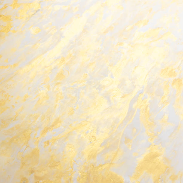 istock Abstract golden textured hand painted background closeup 1136864583