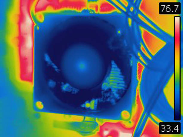 istock Thermal image of cooling fan on cpu inside of computer 1136867421